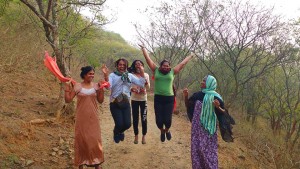 Sahodari girls jumping in joy during a morning walk in Anaikatti hills